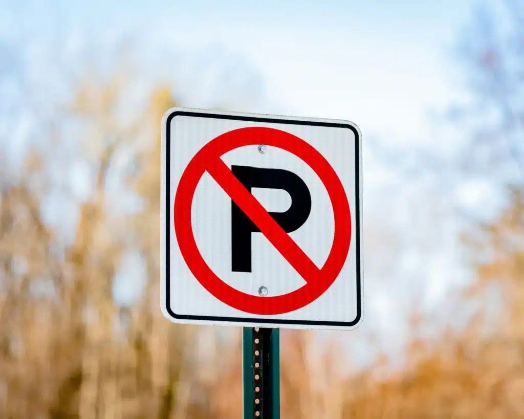 A no parking sign on a street outside of Calgary.